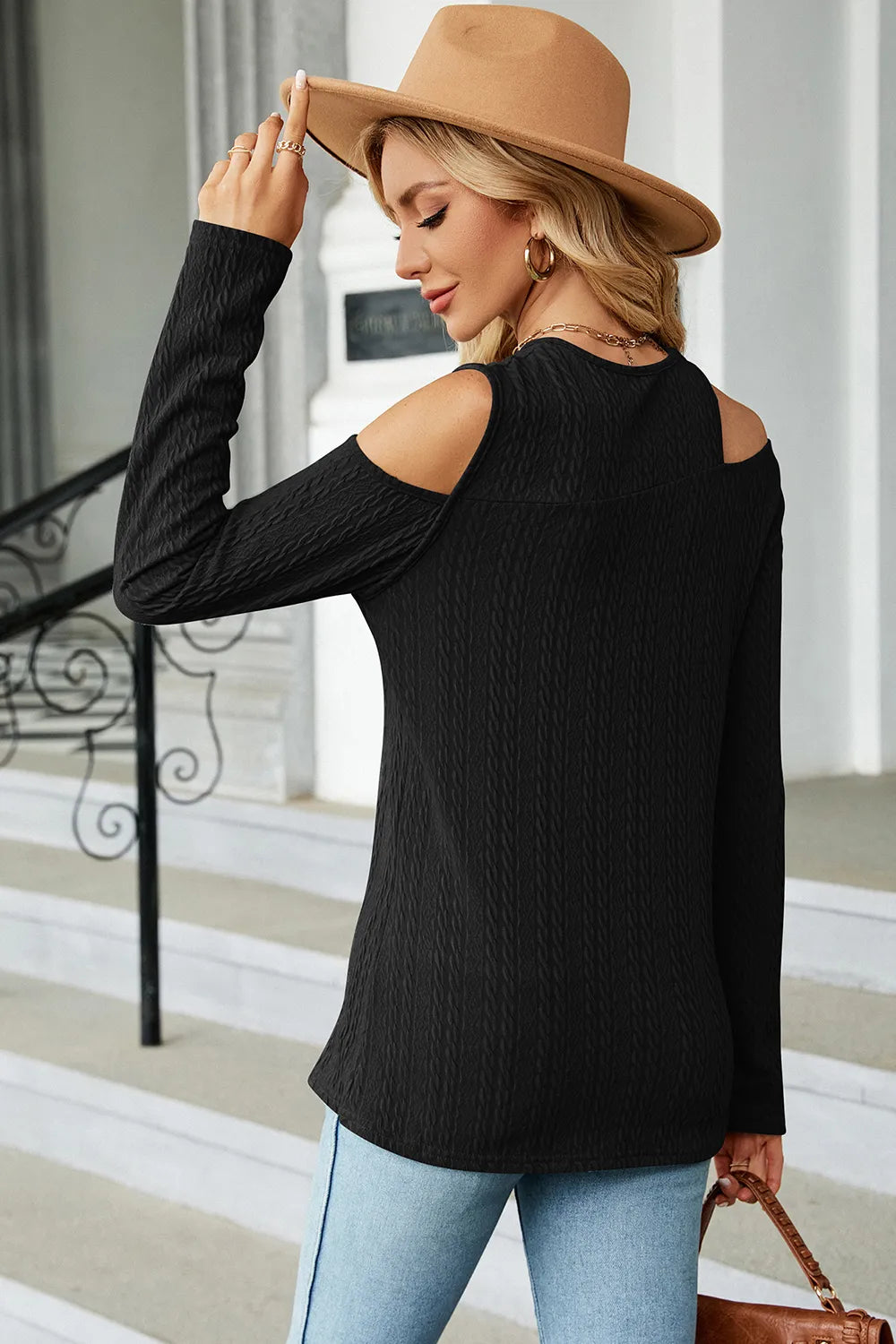 Black cold shoulder blouse with open shoulder detail and comfortable everyday wear