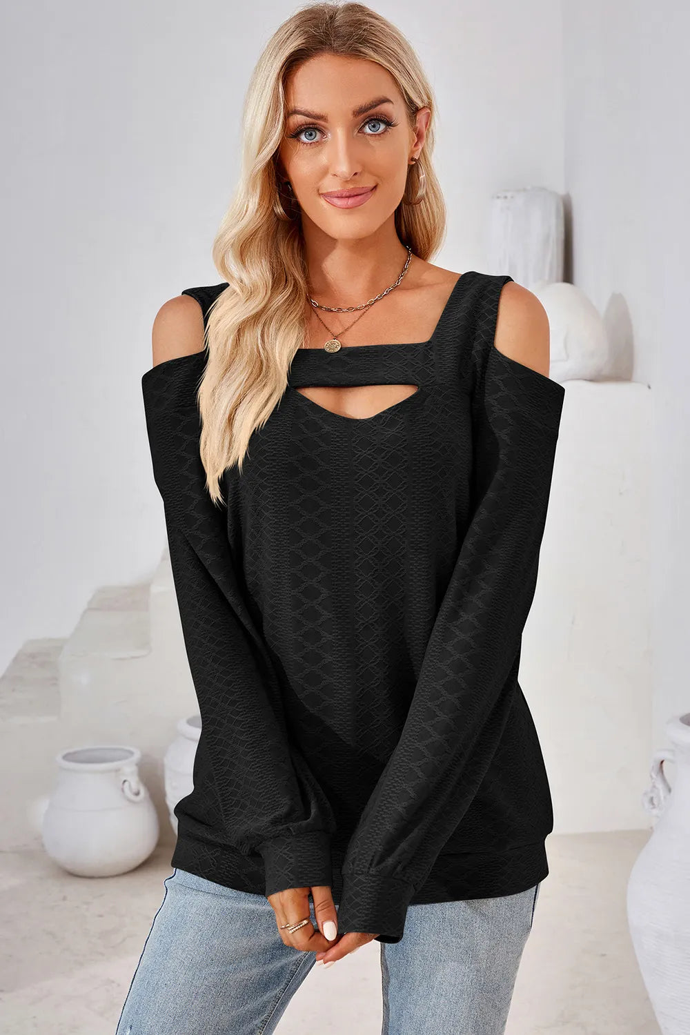 Black cut out square neck cold shoulder top with long sleeves and versatile casual styling