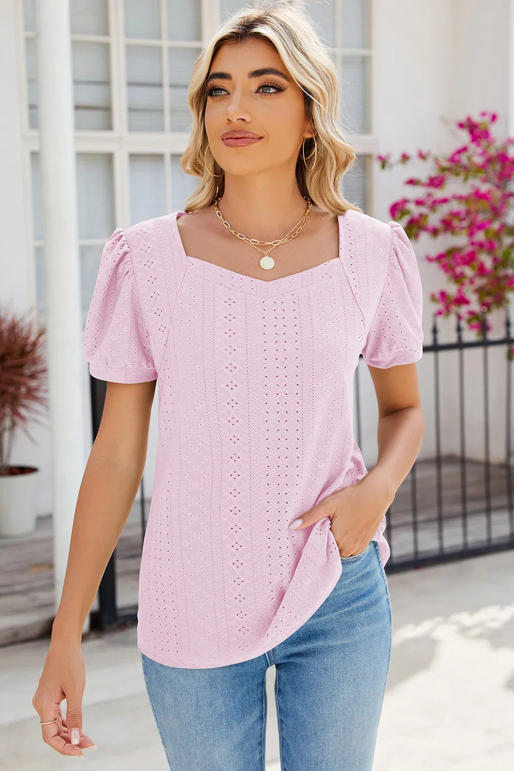 Blush pink puff sleeve blouse featuring eyelet embroidery and lightweight comfort