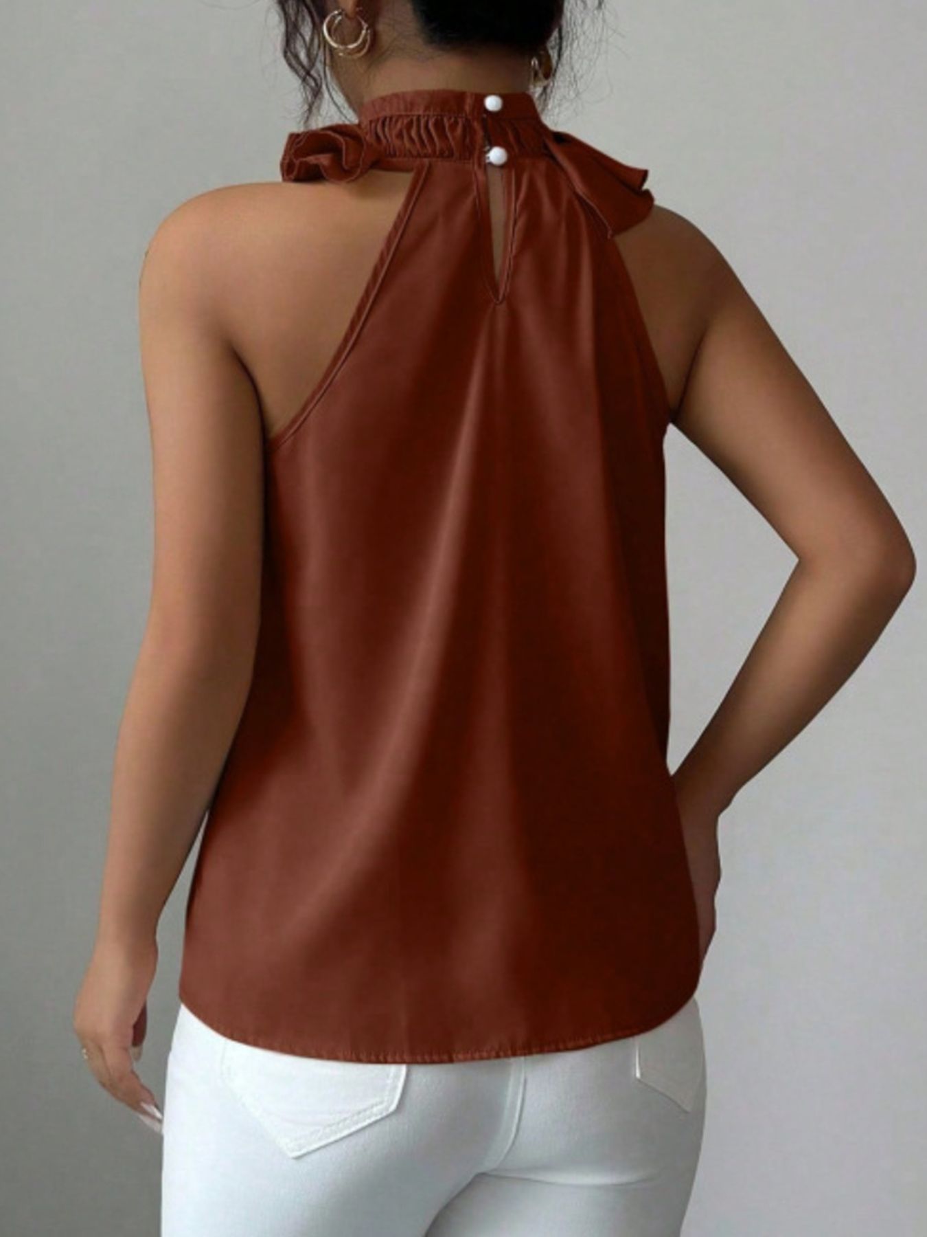 Brownsleeveless high neck top back view with clean silhouette and comfortable fit
