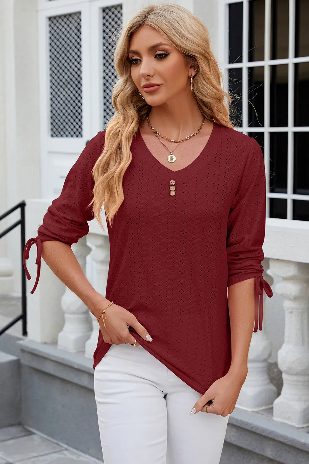 Burgundy eyelet drawstring V neck top with half sleeves and elegant embroidered detailing