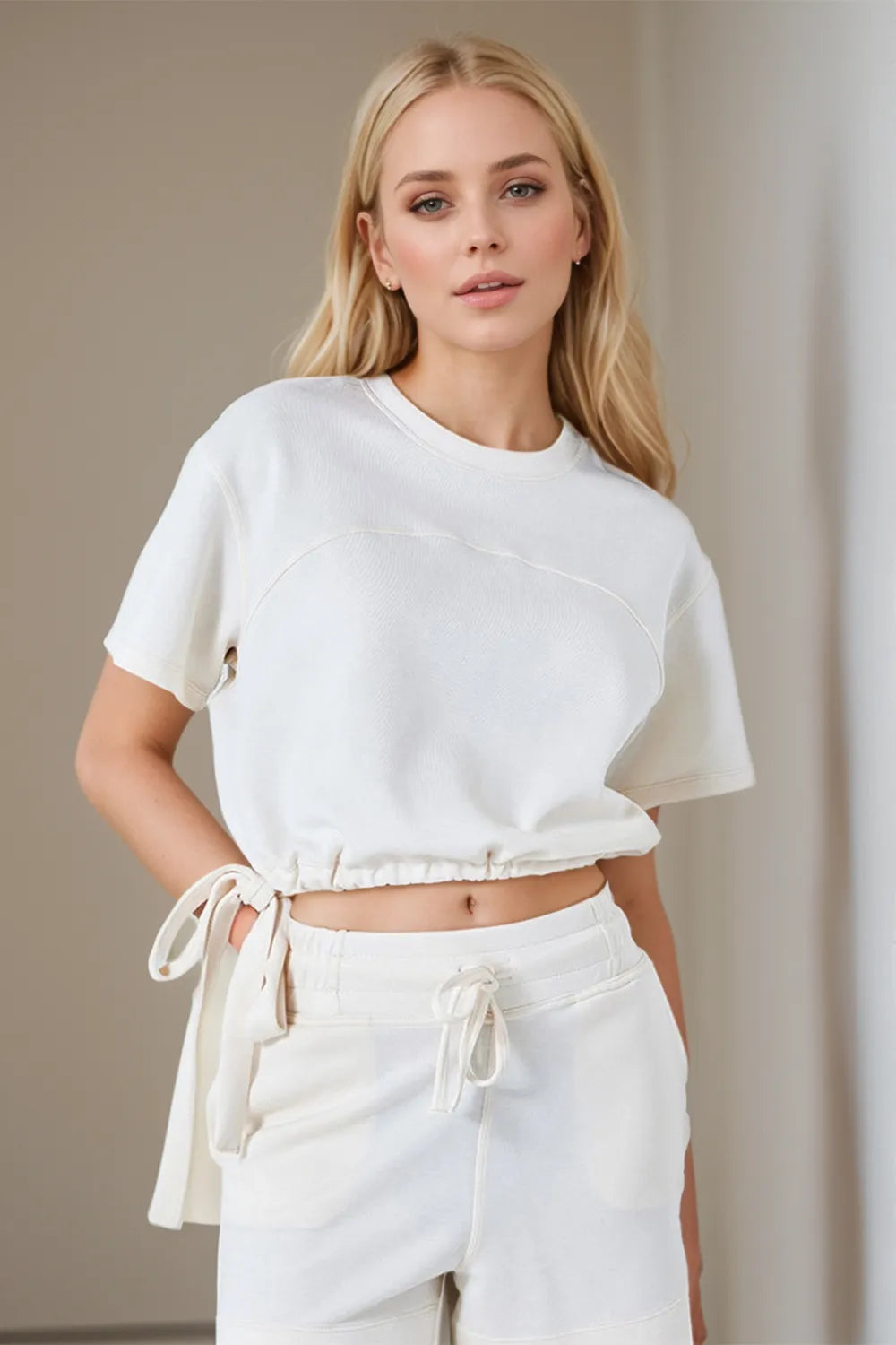 Cream drawstring hem round neck scuba t-shirt side profile comfortable women's casual wear