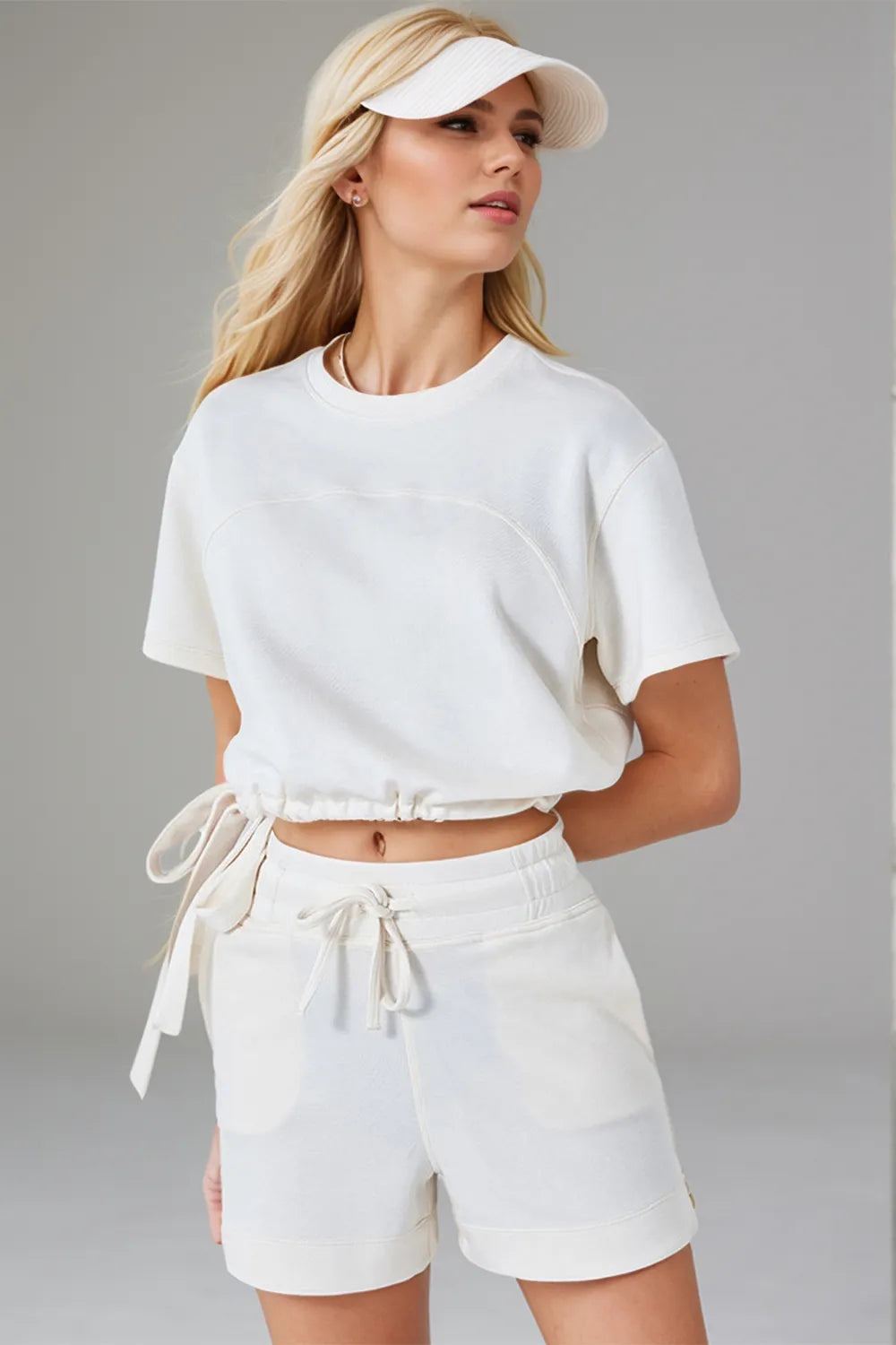 Cream scuba round neck t-shirt with drawstring hem angled view modern women's everyday clothing