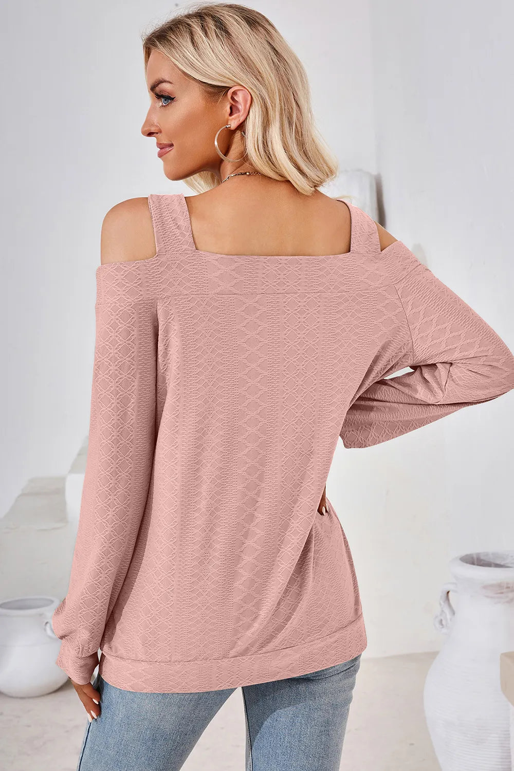 Back view of dusty pink cut out square neck cold shoulder top with long sleeves