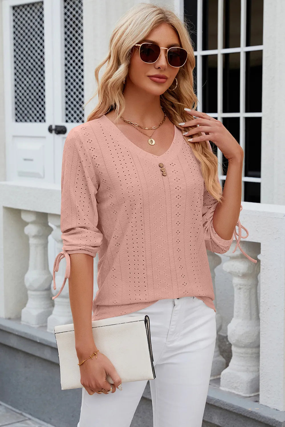 Dusty pink eyelet top with V neckline, half sleeves and relaxed casual fit