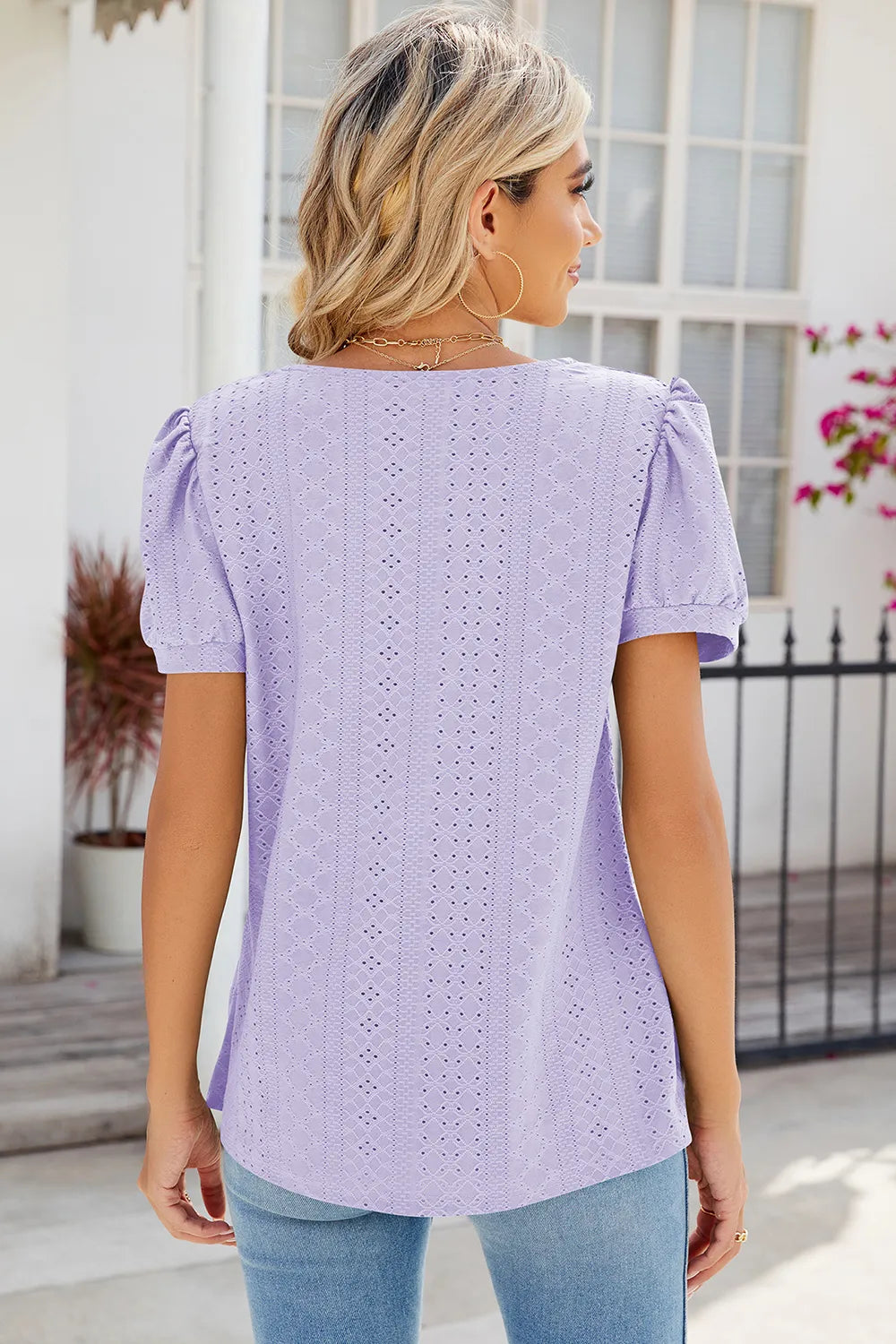 Lavender puff sleeve blouse featuring eyelet embroidery and lightweight breathable fabric Back
