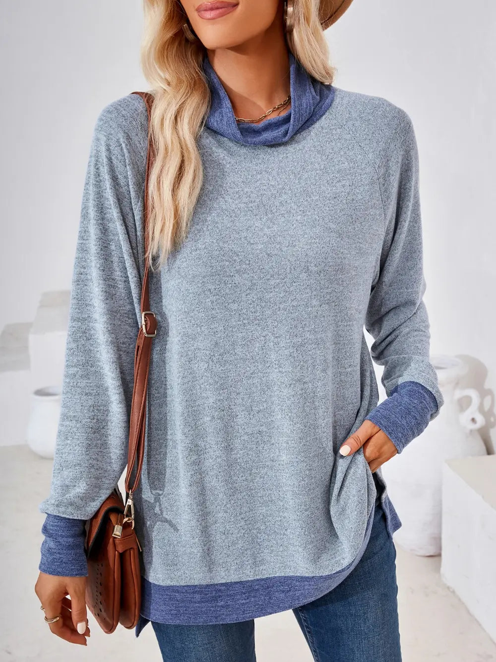 Misty blue casual long sleeve top featuring contrast neckline and flattering silhouette