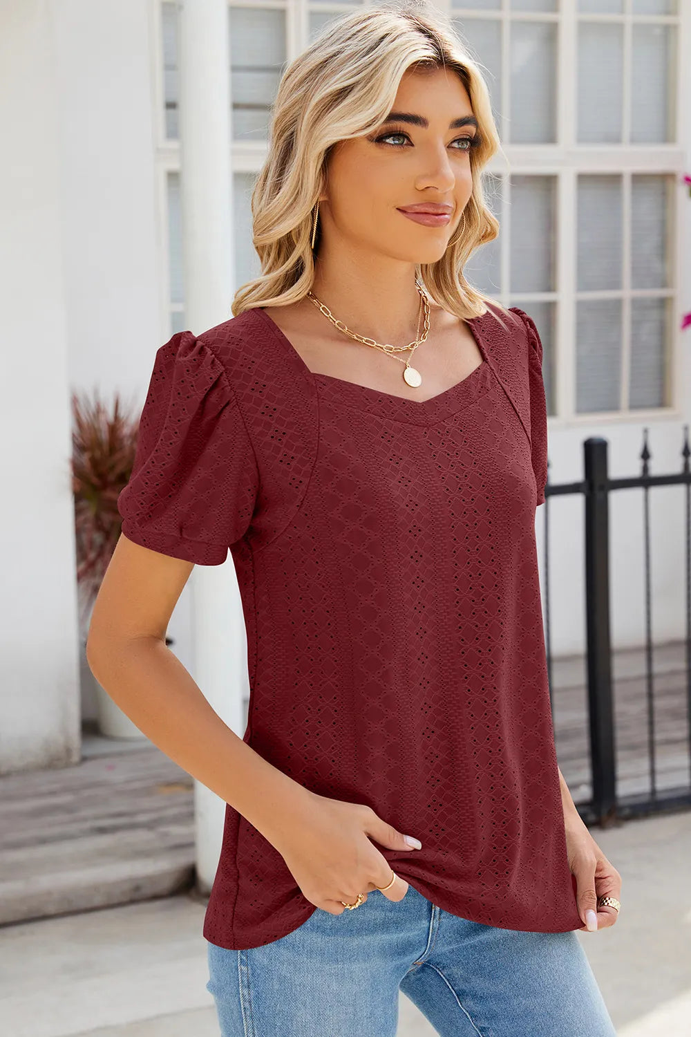 Rust eyelet fashion top with puff sleeves and relaxed feminine styling