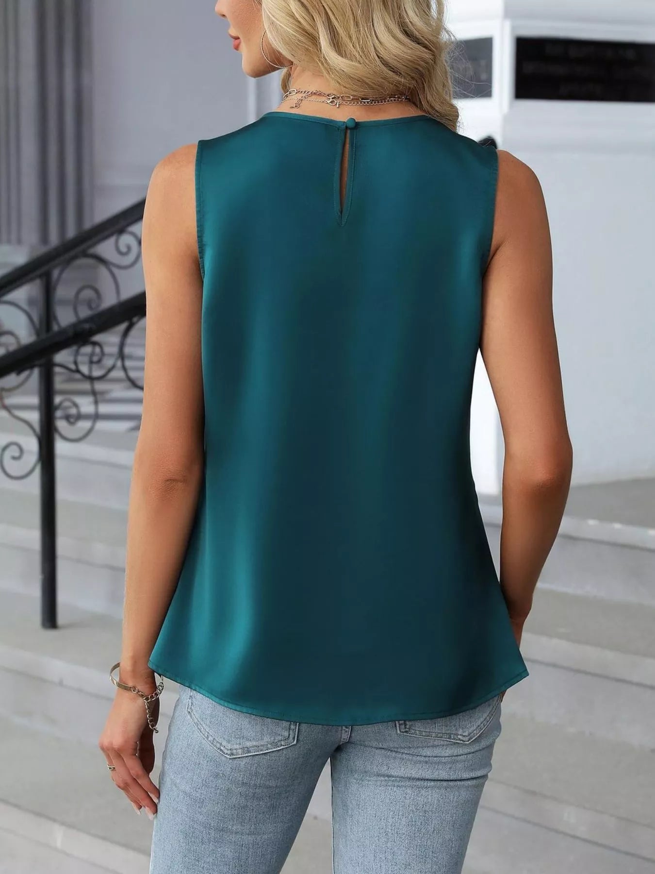 Back view of teal sleeveless tank top with relaxed fit and lightweight casual summer styling
