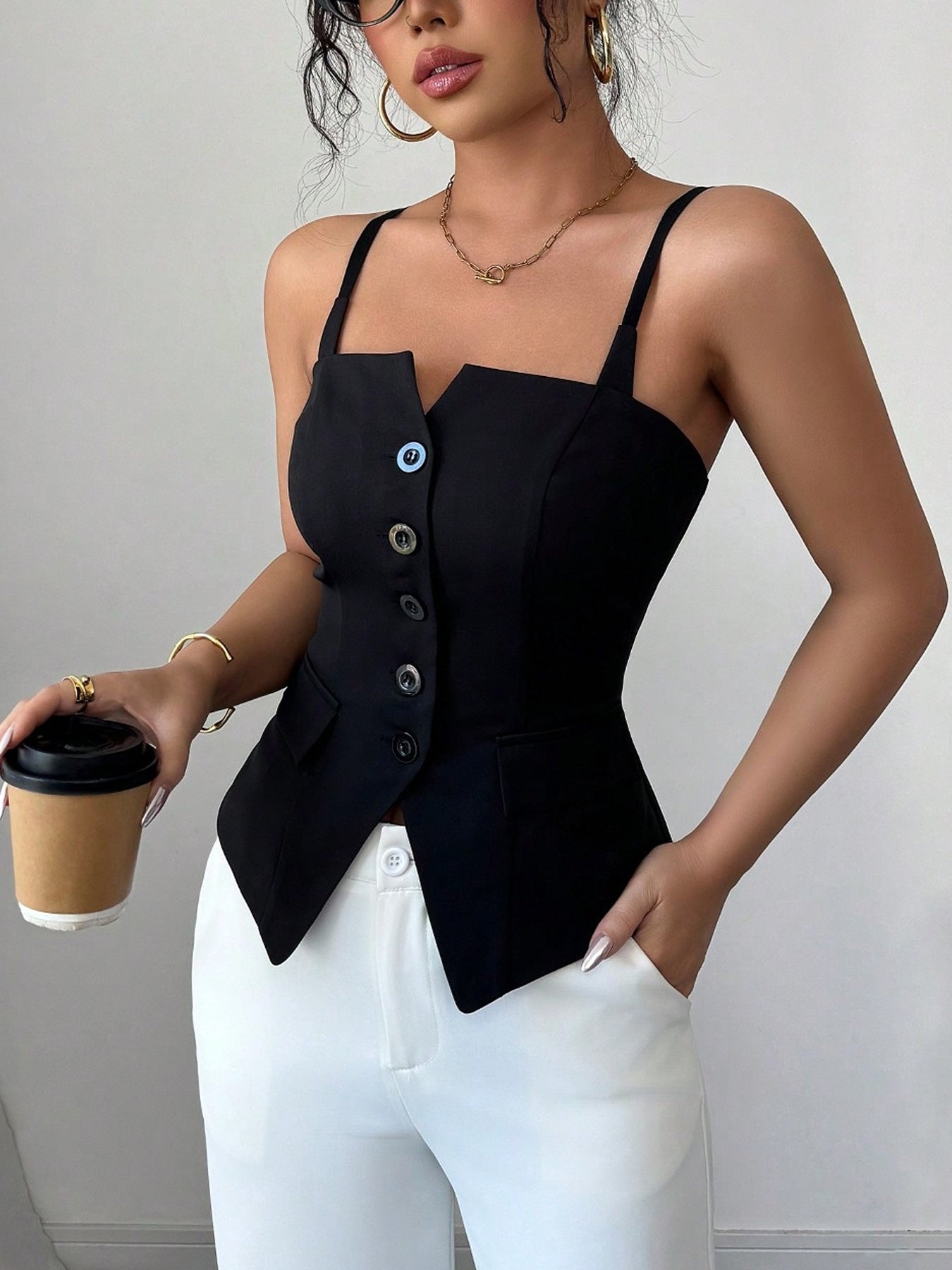 Women's black button-front fitted cami top with spaghetti straps and a structured silhouette, front view